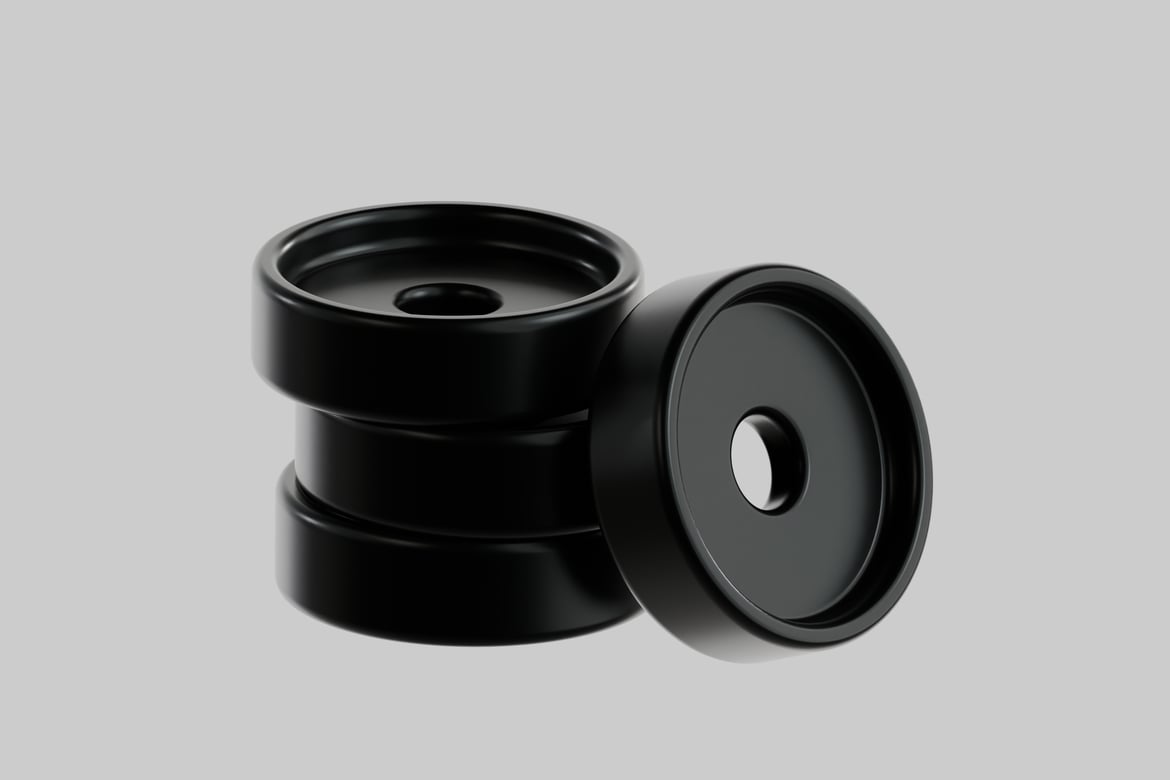 Download Black cylindrical object with circular holes on top and bottom. 3D Model