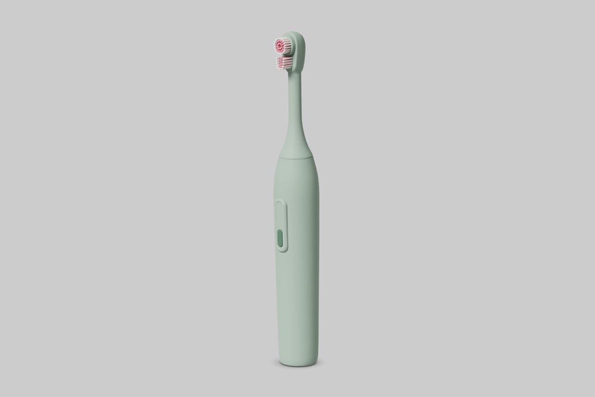 Download Electric toothbrush with green handle and red bristles 3D Model