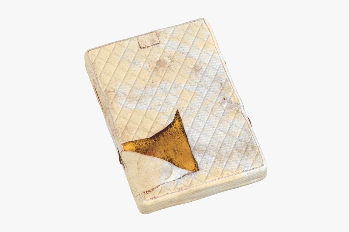 Download Mattres Damaged, Worn Beige Rectangular Object with Diamond Pattern and Triangular Cutout 3D Model